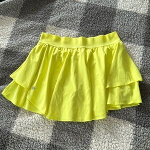 Lululemon size 8 high rise skort EUC neon yellow. Court High Rise Rival Skort
